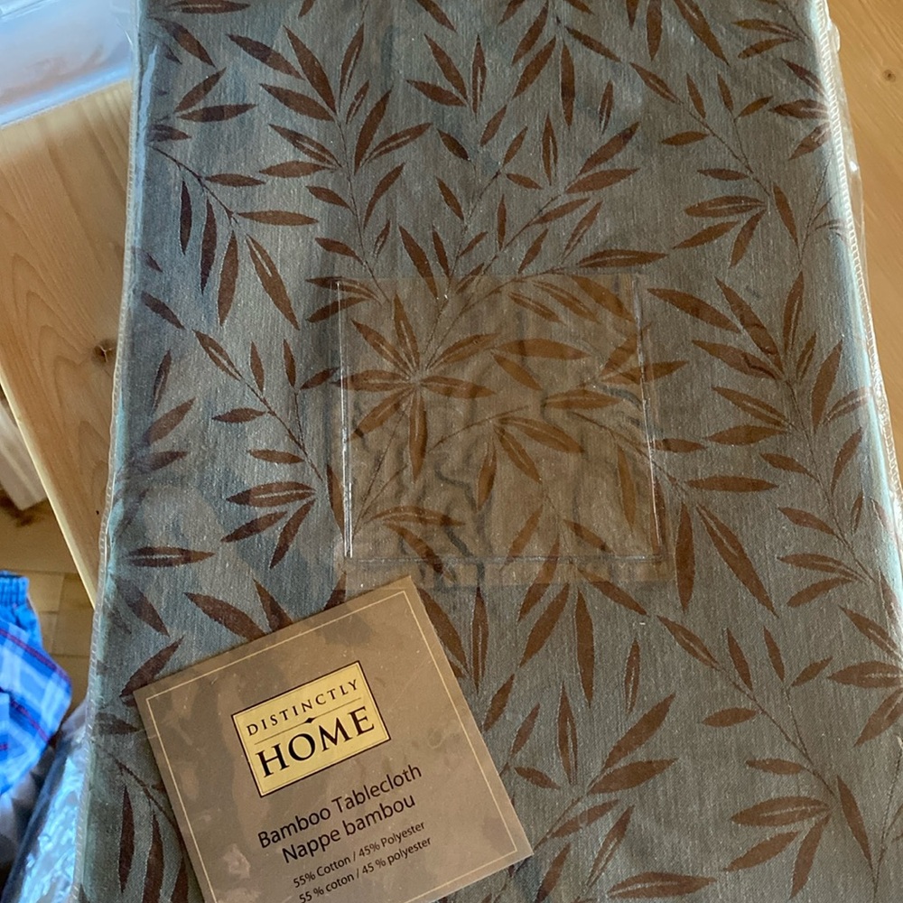 Bamboo patter teal and cocoa colored tablecloth.